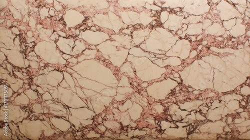 Beautiful natural stone texture showing pink and brown veining across a surface of smooth light beige and white marble background material.