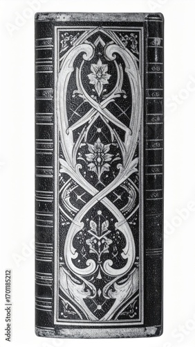 Close Up of Antique Book Spine with Ornate Floral Decorative Details in Black and White