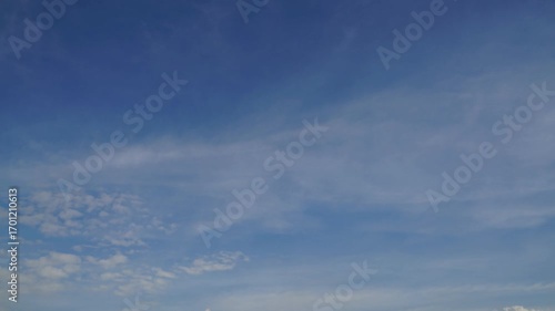 clouds and blue sunny sky,  white clouds over blue sky, Aerial view,  nature, blue sky, white clear weather. Time-lapse video 4 K.
