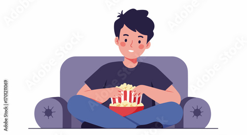 Young man enjoying popcorn on sofa while watching a movie or TV show at home. Leisure and entertainment concept.