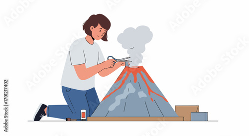 Young student enthusiastically creating a science project volcano model, carefully crafting the eruption with scissors and craft supplies.