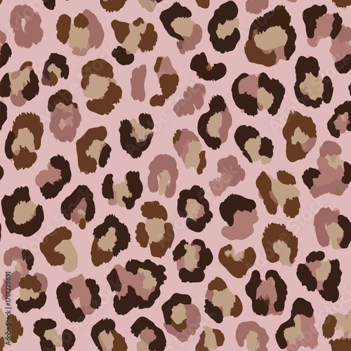 Wallpaper Mural A stylish leopard print pattern features irregular spots of brown and beige on a soft pink background. This design is ideal for fashion and home decor projects. Torontodigital.ca