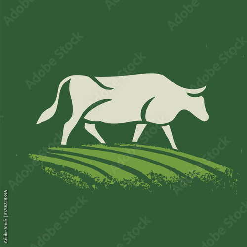 A white cow is seen grazing on lush green grass in a pastoral setting. The clear sky highlights the tranquility of countryside life.