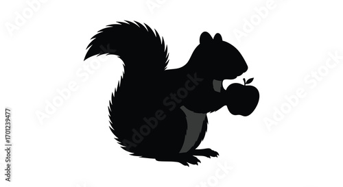 a squirrel silhouette holding an apple in its paws