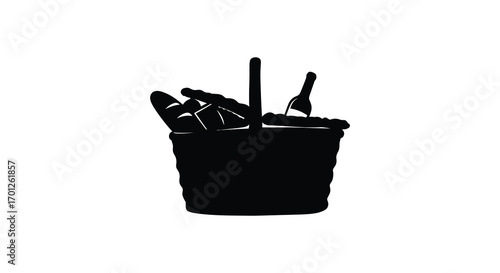 a bucket filled with various cleaning tools silhouetted