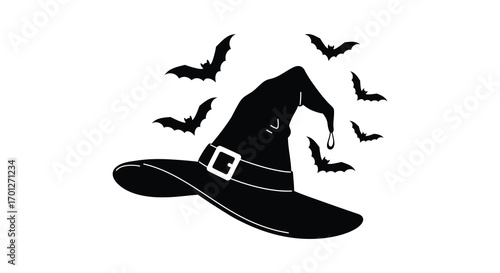 a witch hat surrounded by flying bats in spooky halloween scene