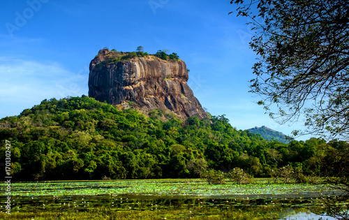Panoramic picture of Sigiriya Rock Fortress, seen from Sigiriya Lake in the cultural triangle of Sri Lanka, Asia