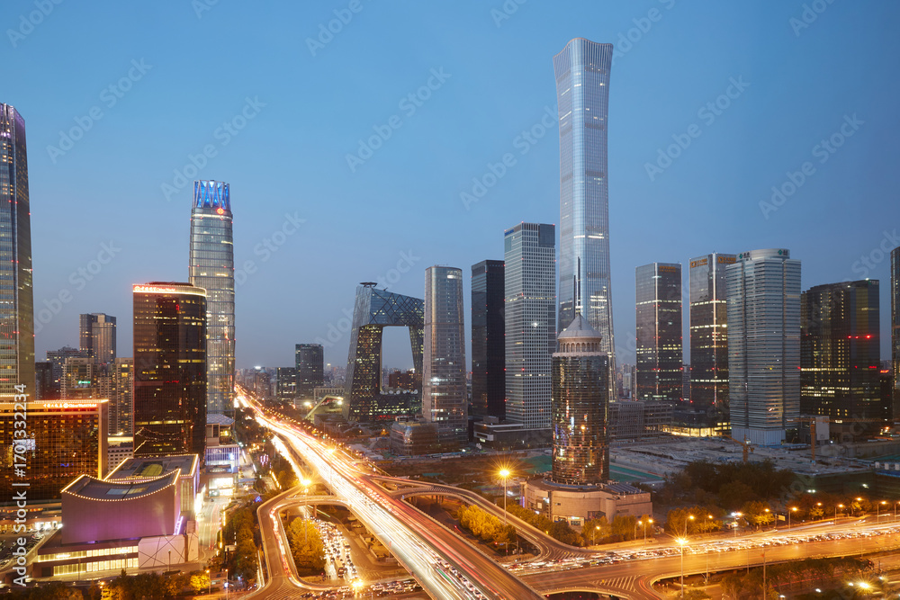 Fototapeta premium Beijing city skyline night view and road traffic flow with light trails, China