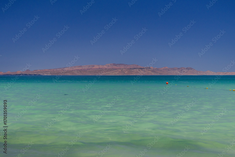 Fototapeta premium View of Espiritu Santo Island from Tecolote Beach