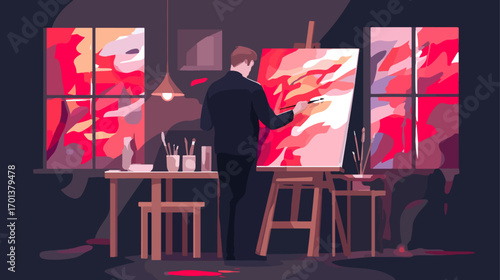 Artist painting in studio at night