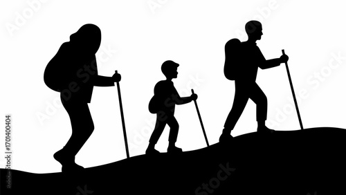 Silhouette of a family hiking up a hill with backpacks and walking sticks under a bright white sky scenery