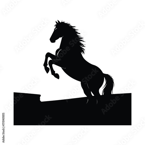 Elegant Horse Silhouette Rearing in a Grassy Field with a Lone Tree Background