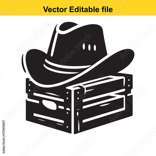 Black cowboy hat on a wooden crate, isolated on white background