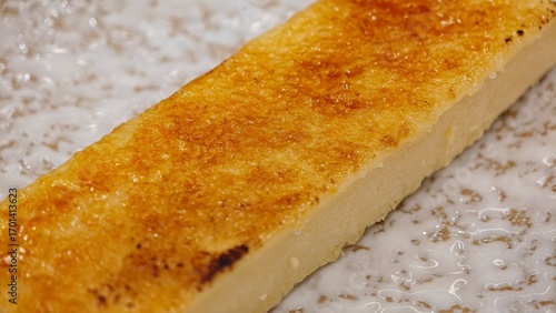 Fotografie Crème brûlée, vanilla beans, blowtorch, sugar.