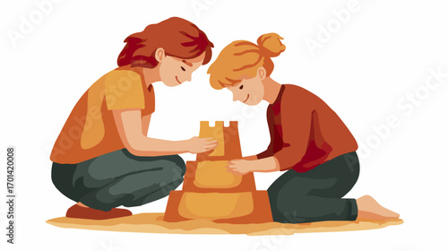 Children building sandcastle together