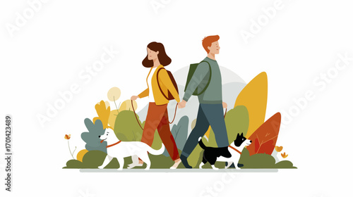 Couple walking dogs in park