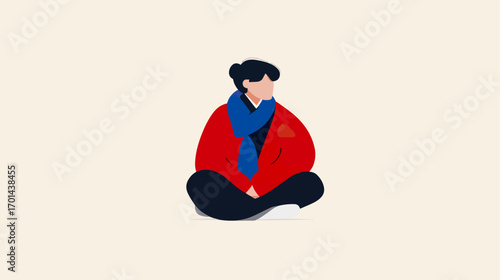 Person sitting in traditional attire