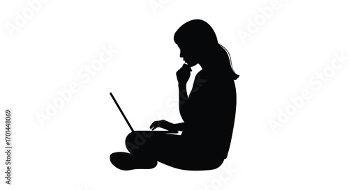 a silhouette of a person using laptop while sitting