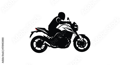 a biker riding swiftly on sleek motorcycle silhouette