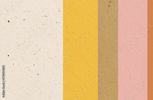 Flat Lay of Textured Paper with Pastel Yellow and Pink Stripes on Beige Background