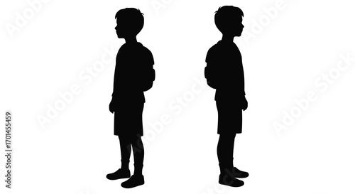 silhouette of two boys standing side by side