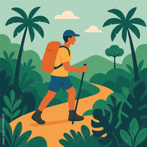 Man hiking on a path through a lush tropical forest.