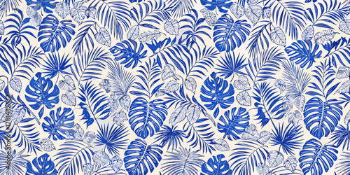 Seamless tropical leaf pattern in blue and white hand drawn botanical illustration