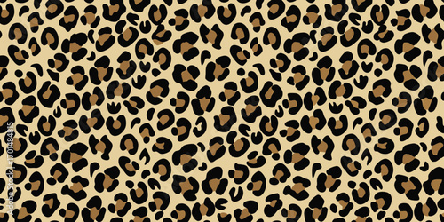 Seamless leopard print pattern with black and brown spots on a tan background