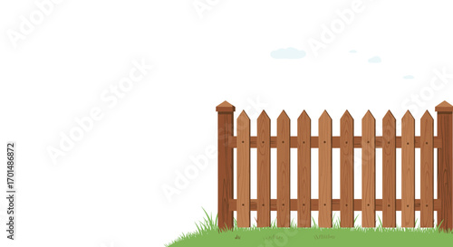 A charming wooden picket fence stands guard over a lush green lawn under a clear sky with a few wispy clouds