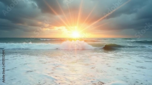 Overcast sky on rainy day with foamy waves rolling towards golden sand beach under low warm sun light. Nobody. Abstract nautical summer ocean sunset nature. Weather and climate change