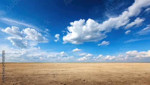Expansive sky over a vast, dry plain