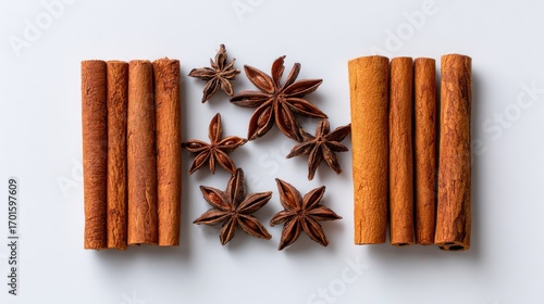 Fototapeta Naklejka Na Ścianę i Meble -  Cinnamon Sticks And Star Anise Spices On White Background