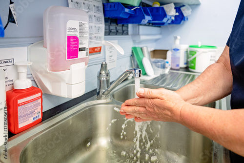 Nurse washing hands in medical clinic hospital