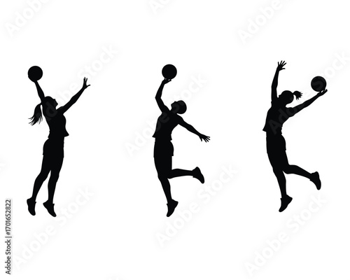 Three silhouettes of female basketball players in mid air jumping to shoot or dunk during a competitive game