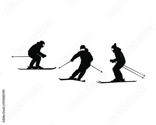 Silhouettes of three skiers in action on a snowy slope during a winter day dynamic movement