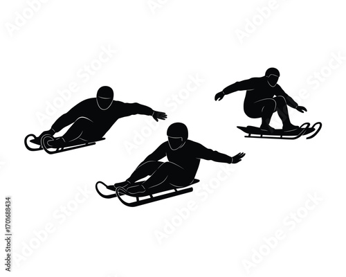 Three silhouettes of people sledding downhill on snow sleds in dynamic poses against a white background