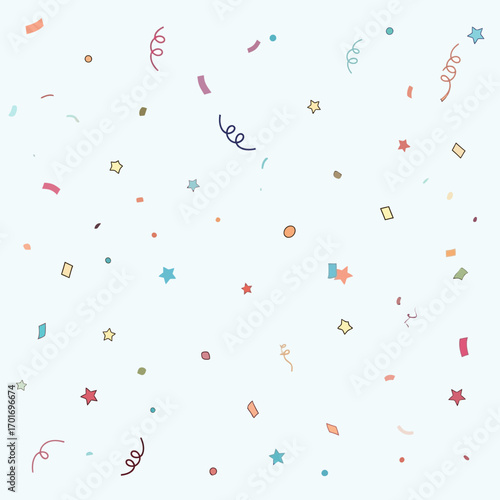 Colorful confetti and streamers scattered against a light-colored background, creating a celebratory atmosphere.