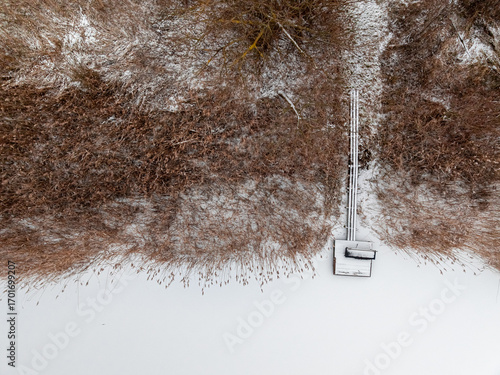 Flying above snow-covered j...