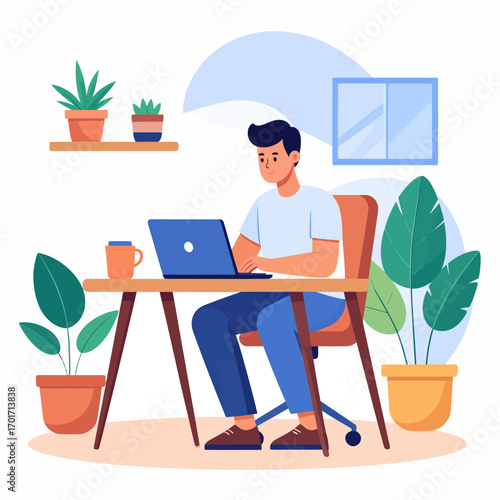 Man working remotely from home at his desk with a laptop