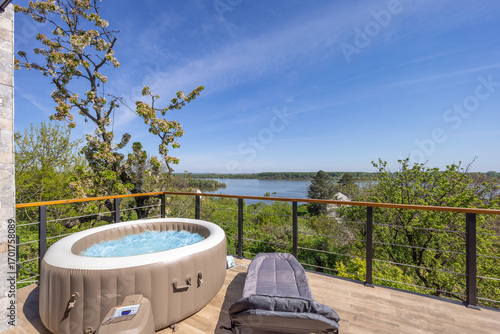 Outdoor inflatable  jacuzzi with river view
