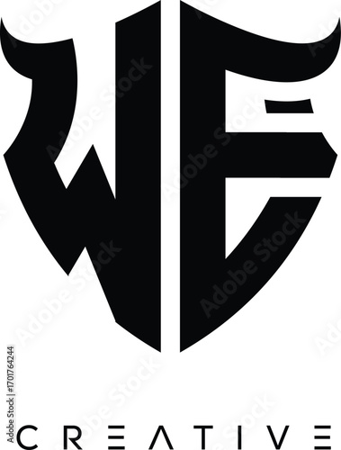 Fotografie WE Shield Monogram Logo with Bull Horn – Bold Emblem Symbol for Security, Protec