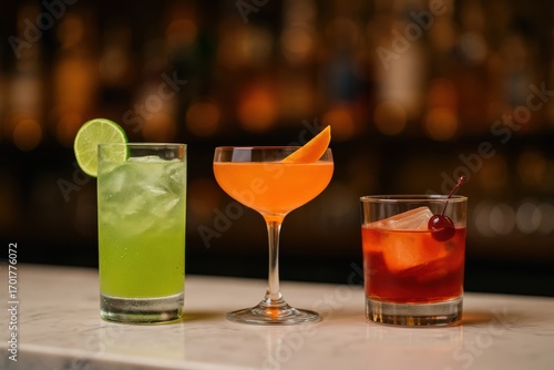 Trio of Colorful Cocktails on Marble Bar Top