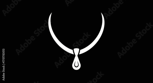 Elegant white necklace with teardrop pendant on black background.