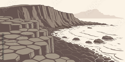 Dramatic coastal landscape showcases unique hexagonal basalt columns meeting the ocean waves against a backdrop of distant, misty mountains