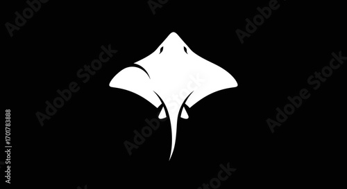 Elegant white stingray silhouette on a stark black background.