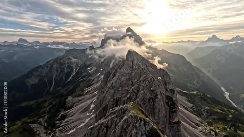 Epic mountain flight through clouds, golden hour, soaring bird