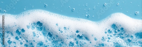 Light blue soapy foam with bubbles