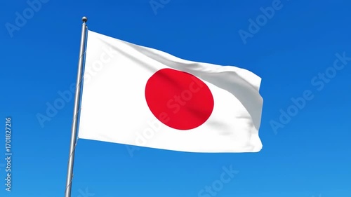 Japanese flag waving majestically against a clear blue sky