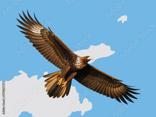 Golden eagle soaring high in the sky with its wings spread wide against a cloudy blue backdrop