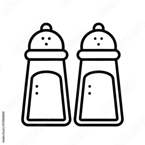 Isolated two glass shakers containing salt and pepper seasonings